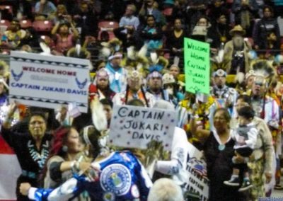 crowd welcoming military captain back