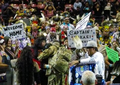 crowd welcoming military captain back