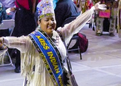 Miss Indian World waving