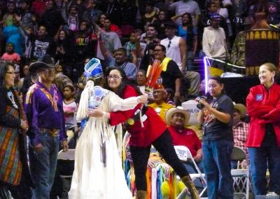 Miss Indian World hugging woman