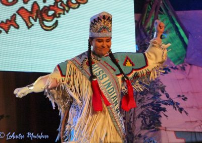 Miss Indian World waving