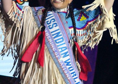 Miss Indian World waving