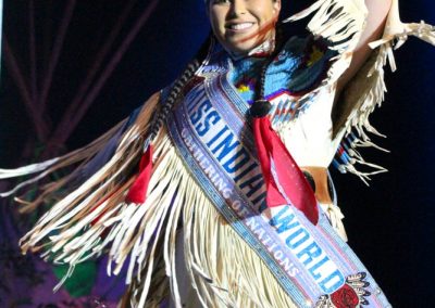 Miss Indian World waving