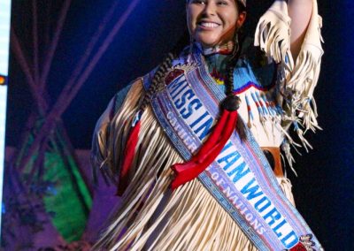 Miss Indian World waving