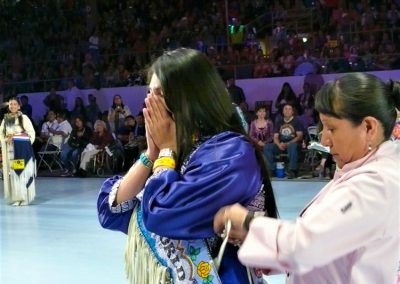 Miss Indian World being given a sash