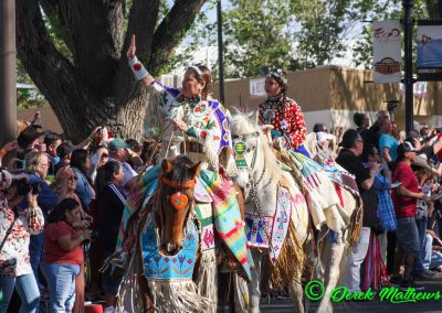 woman and girl on horses