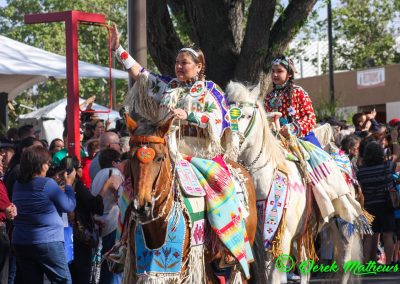 woman and girl on horses