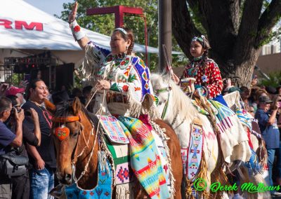 woman and girl on horses