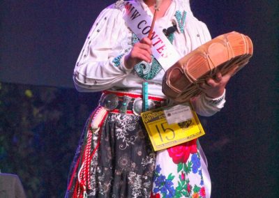 Miss Indian World contestant playing the drum