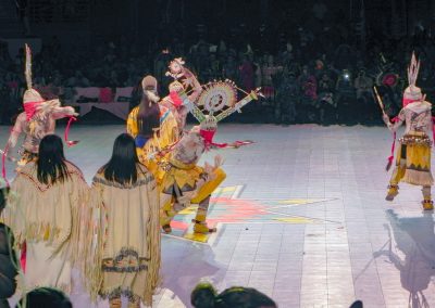 Men dancing at Miss Indian World event