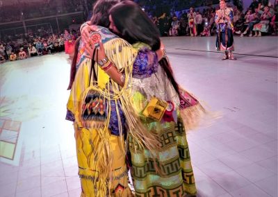 Miss Indian World hugging last year's Miss Indian World