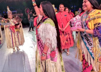 Miss Indian World waving