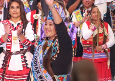 Miss Indian World waving