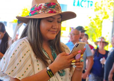 woman looking at her phone