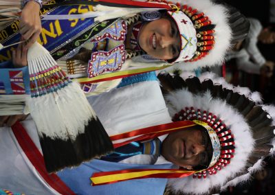 man and woman in headdresses