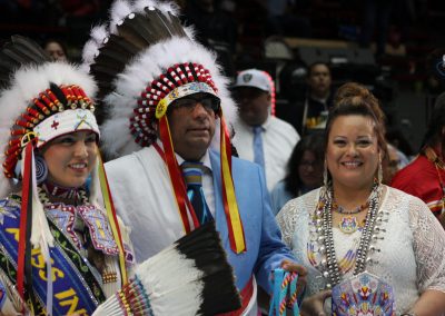 man in woman in headdresses