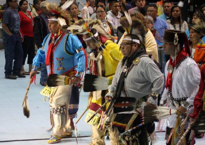 men walking to center stage