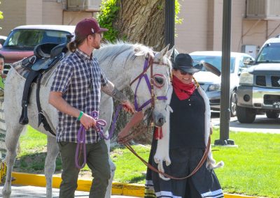 man and woman with horse