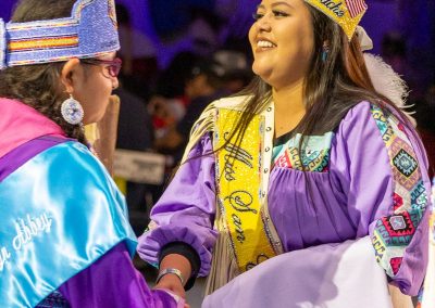 Miss Indian World shaking hands