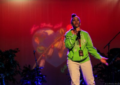 woman on stage singing