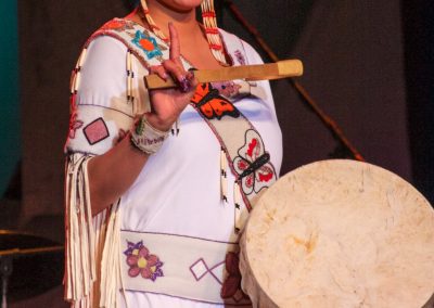 woman playing drum