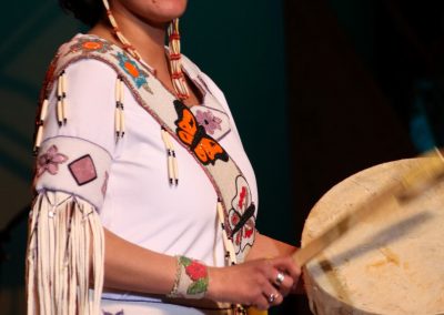 woman playing drum