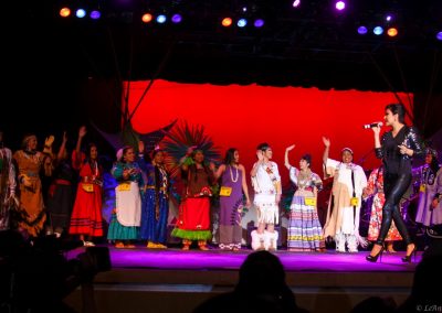 women on stage singing